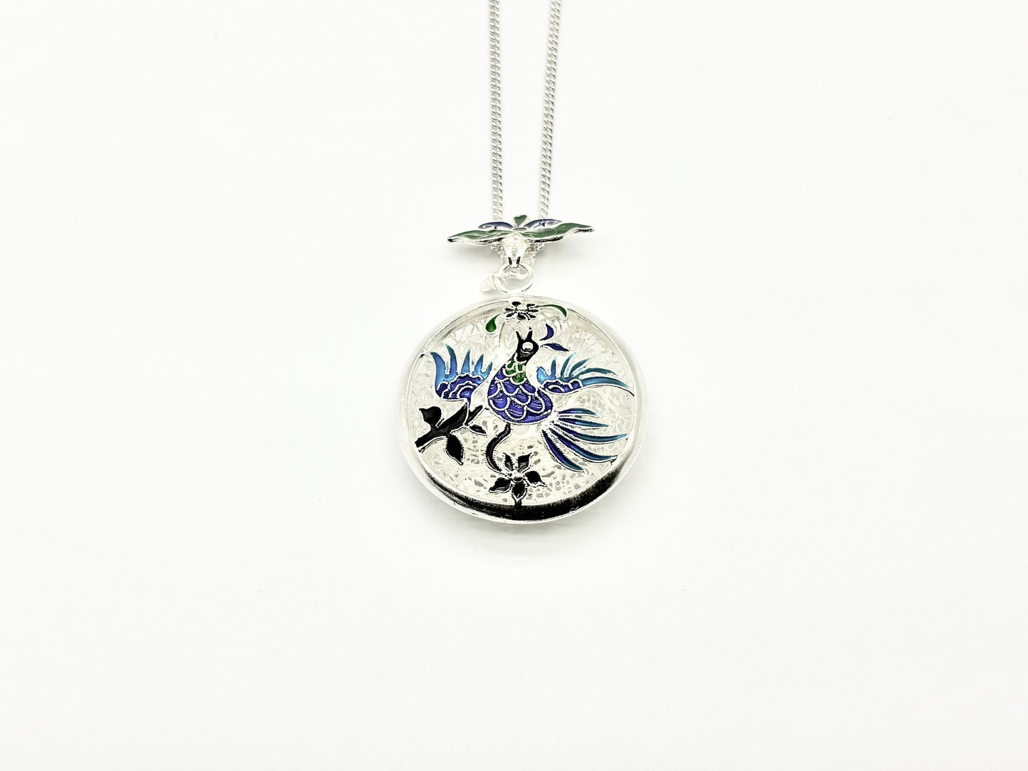 Hollow Blue Dancing Bird Pendant