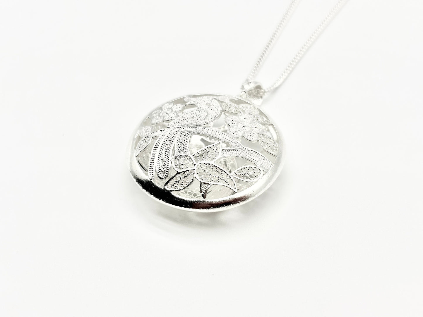 Hollow Round Bird Pendant