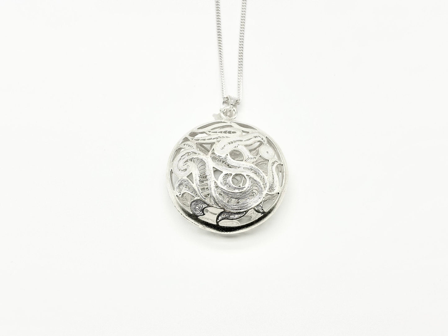 Round Hollow Dragon Pendant