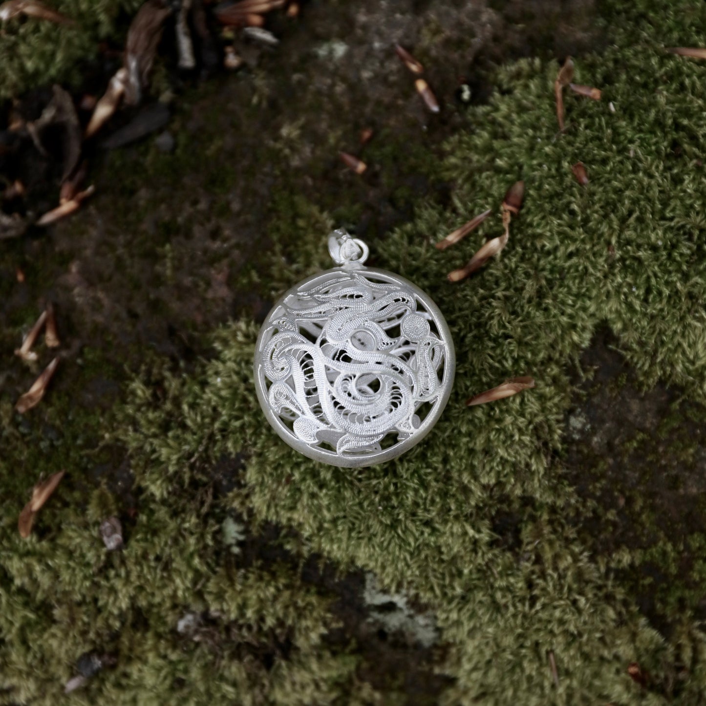 Round Hollow Dragon Pendant